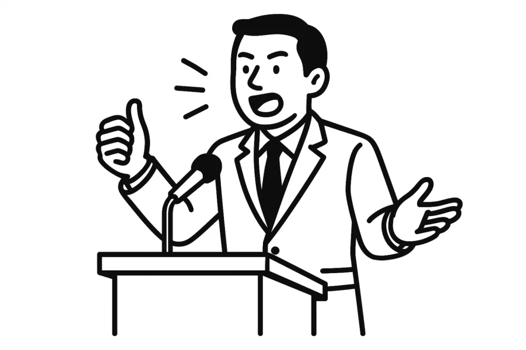 演台に立って講演をする男性